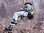Rapelling to cliff dwelling